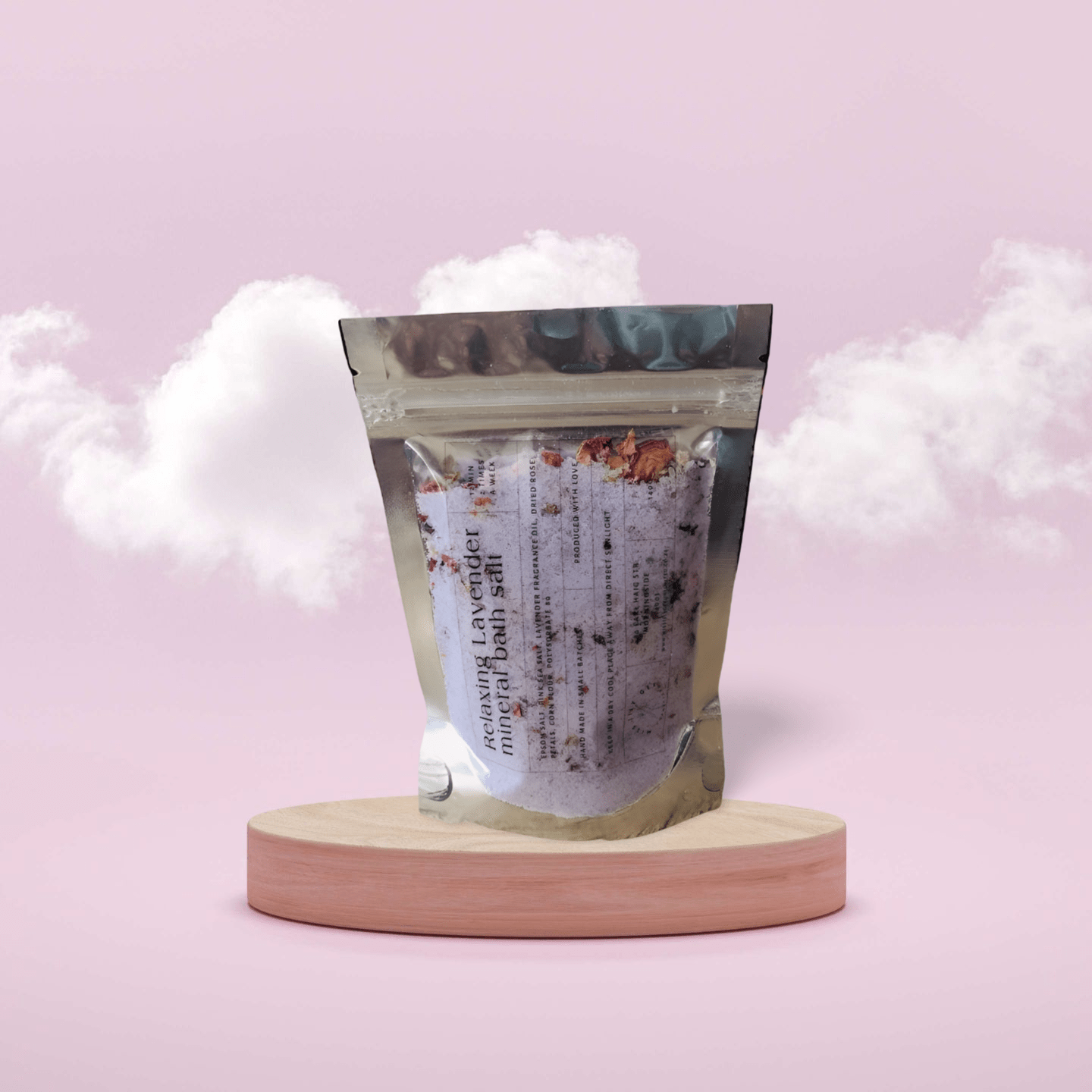 A pouch of Relaxing Lavender Mineral Bath Salt with dried rose petals, designed to soothe and detoxify the skin.