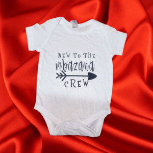 Baby Onesie that includes the family name